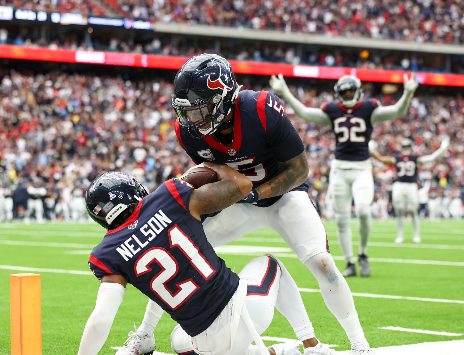 Texans cornerback Steven Nelson (21) celebrates with safety Jalen Pitre (5) after Nelson made an interception to end the Saints’ final opportunity to tie the game in an NFL game between the Texans and the Saints on October 15, 2023 in Houston. The Texans won, 20-13.