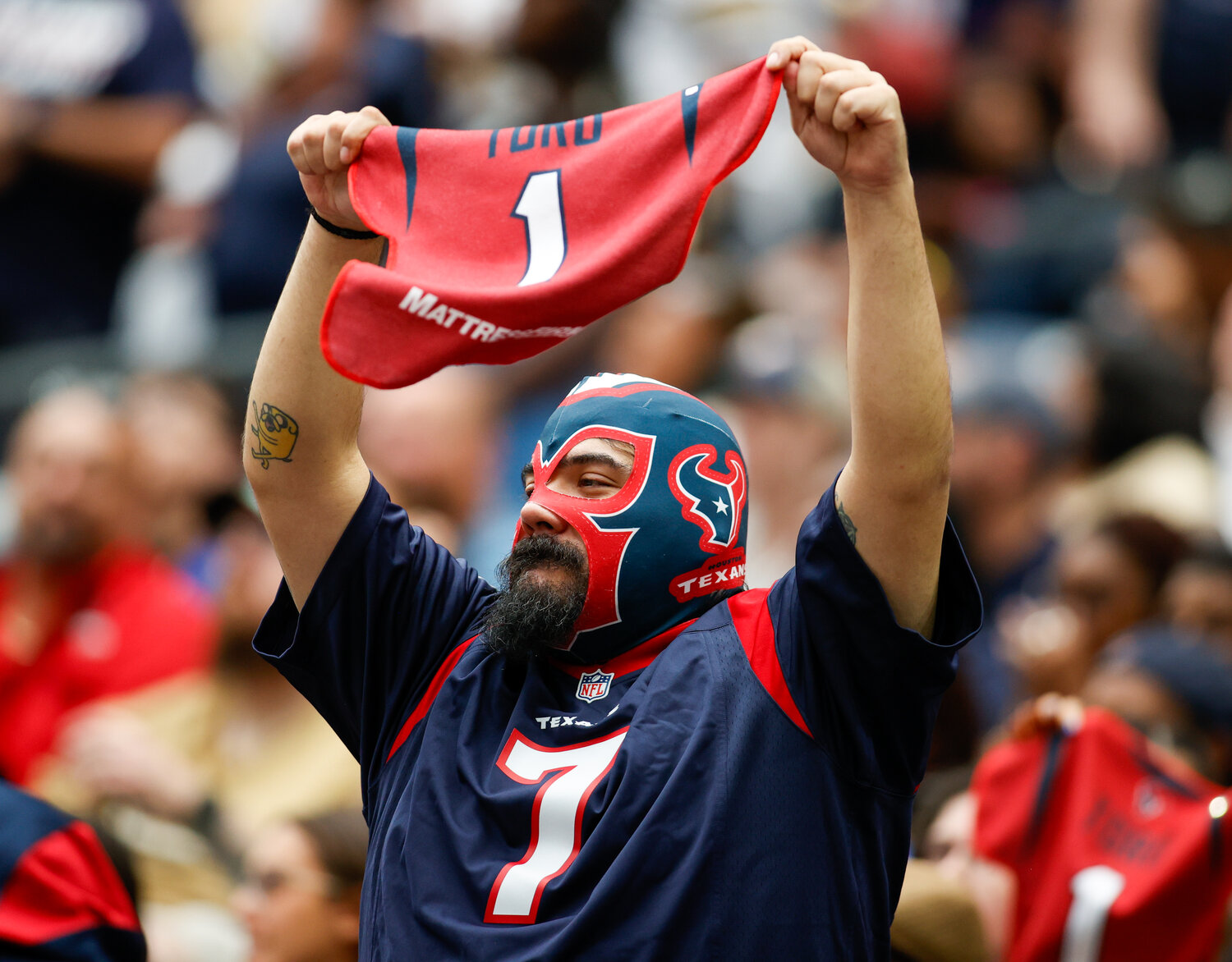 A Houston Texans fan during an NFL game between the Texans and the Saints on October 15, 2023 in Houston. The Texans won, 20-13.