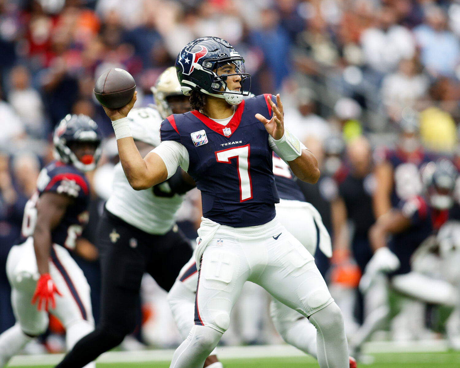 Texans quarterback C.J. Stroud (7) passes the ball during an NFL game between the Texans and the Saints on October 15, 2023 in Houston. The Texans won, 20-13.