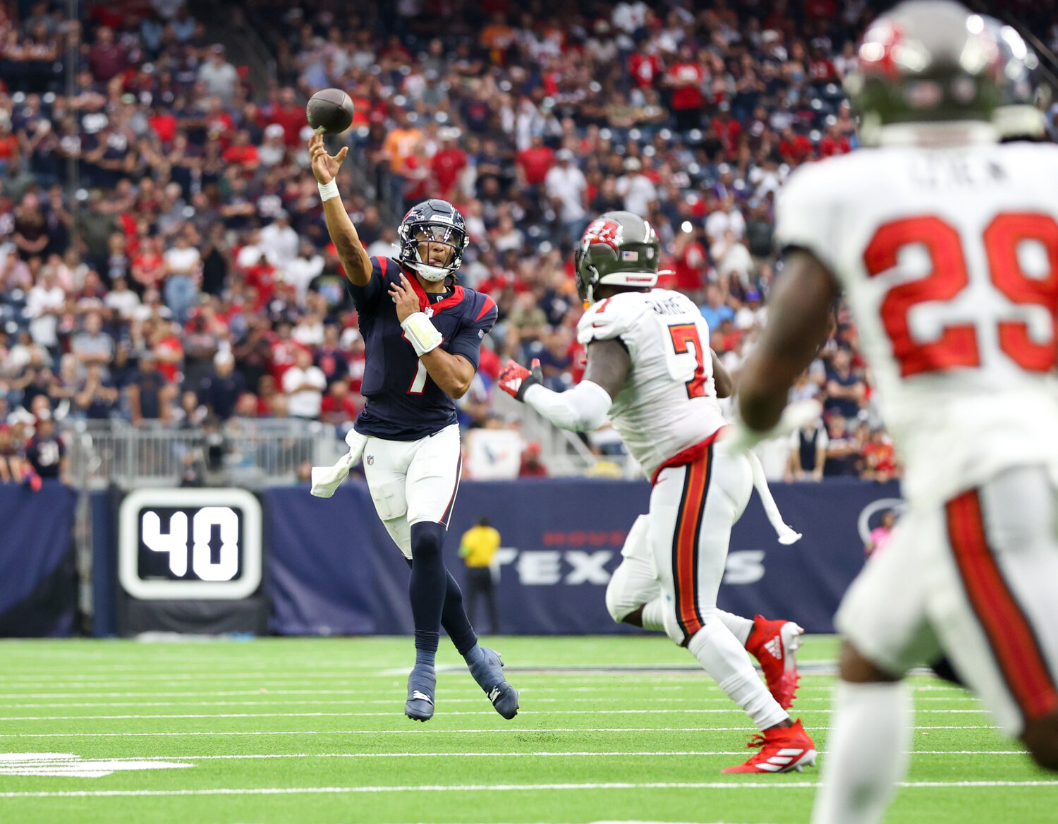 Texans quarterback C.J. Stroud (7) passes the ball during an NFL game between the Houston Texans and the Tampa Bay Buccaneers on November 5, 2023 in Houston.