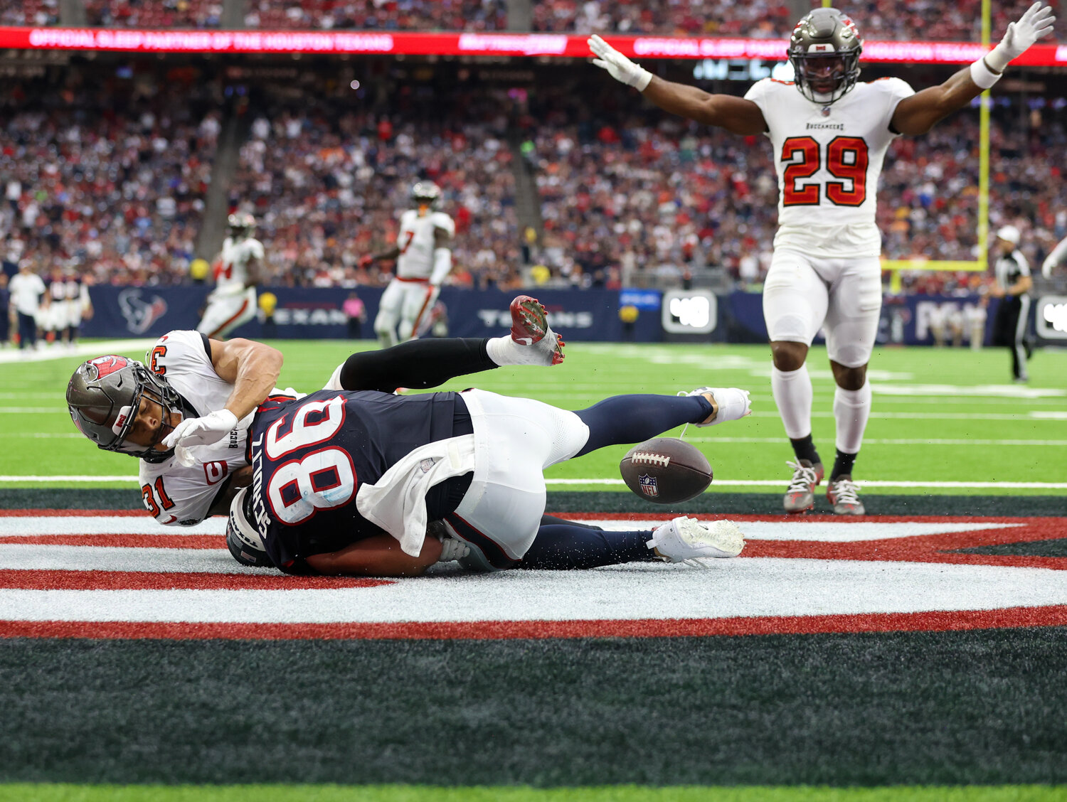 Buccaneers safety Christian Izien (29) reacts as Texans tight end Dalton Schultz (86) drops a would-be touchdown pass in the end zone during an NFL game between the Houston Texans and the Tampa Bay Buccaneers on November 5, 2023 in Houston.