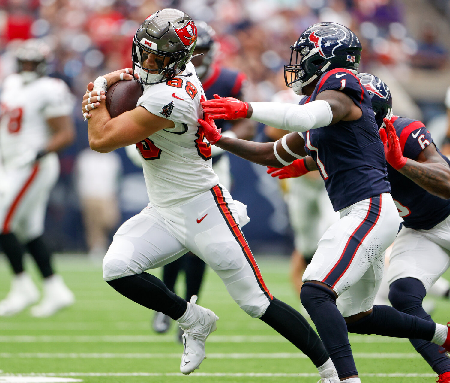 Buccaneers tight end Cade Otton (88) carries the ball after a catch during an NFL game between the Houston Texans and the Tampa Bay Buccaneers on November 5, 2023 in Houston.
