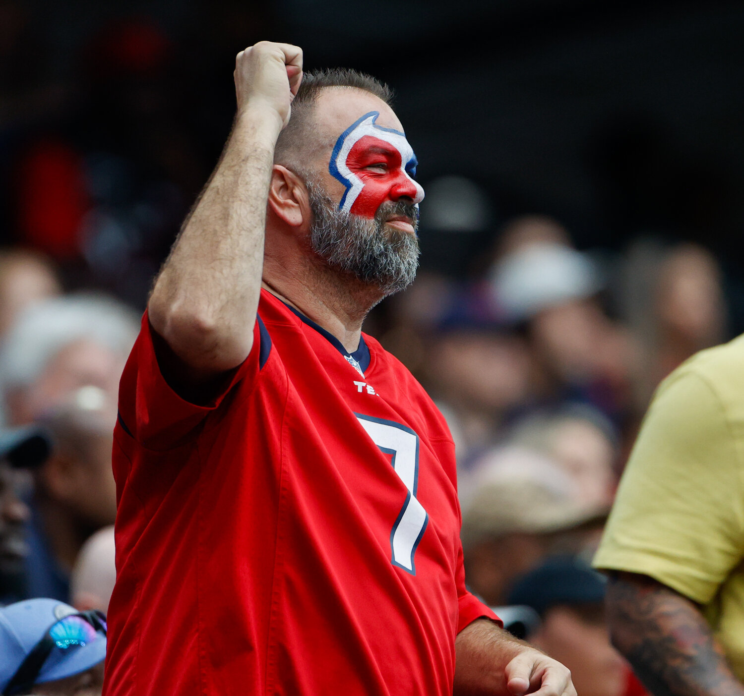 A Houston Texans fan reacts after a touchdown during an NFL game between the Texans and the Tampa Bay Buccaneers on November 5, 2023 in Houston.