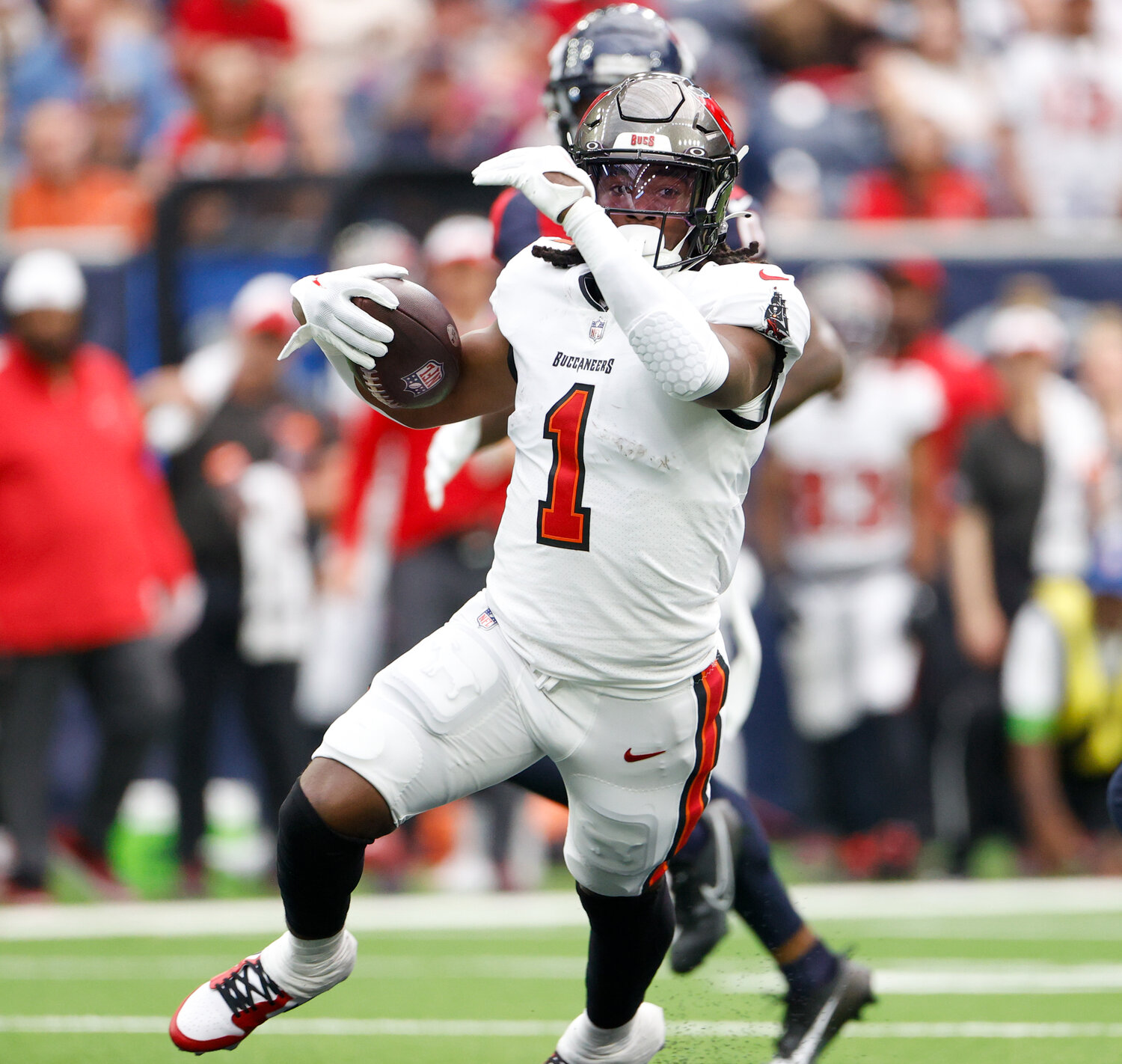 Buccaneers running back Rachaad White (1) carries the ball during an NFL game between the Houston Texans and the Tampa Bay Buccaneers on November 5, 2023 in Houston.