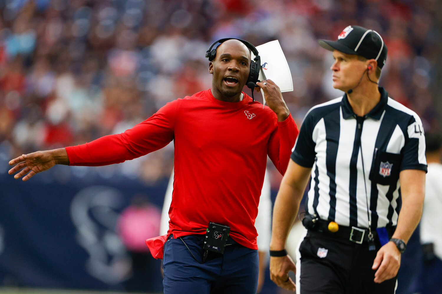 Texans head coach DeMeco Ryans questions line judge Brian Bolinger after a flag during an NFL game between the Houston Texans and the Tampa Bay Buccaneers on November 5, 2023 in Houston.