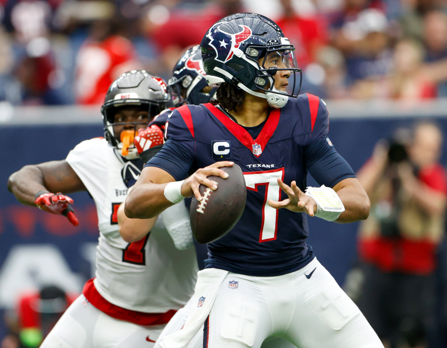 Texans quarterback C.J. Stroud (7) looks to pass the ball during an NFL game between the Houston Texans and the Tampa Bay Buccaneers on November 5, 2023 in Houston.