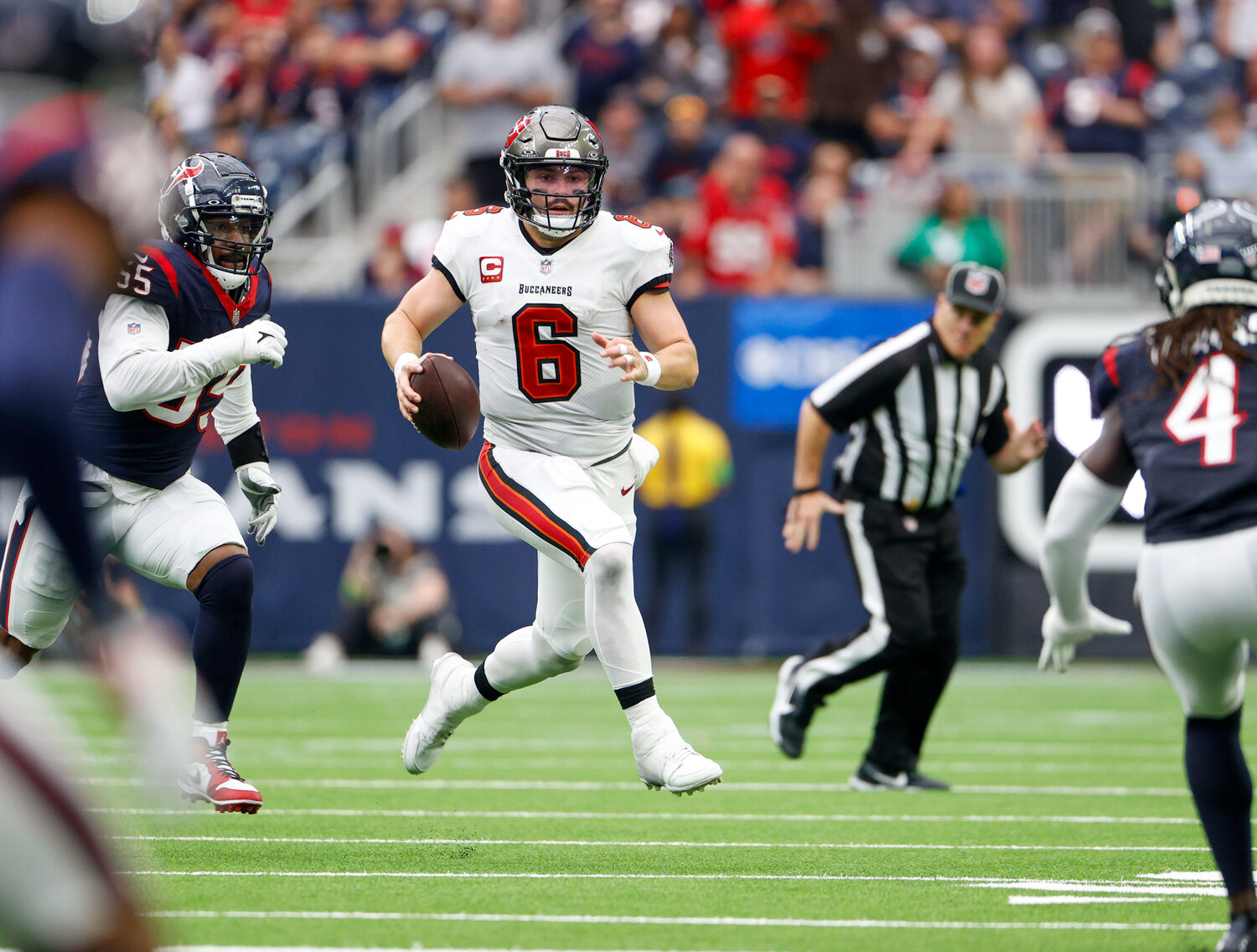 Buccaneers quarterback Baker Mayfield (6) scrambles for a first down during an NFL game between the Houston Texans and the Tampa Bay Buccaneers on November 5, 2023 in Houston.