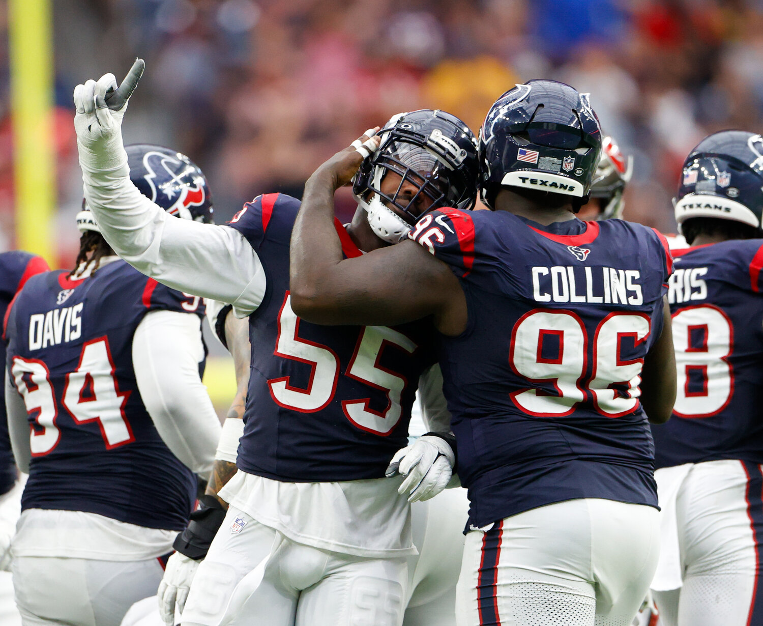 Texans defensive end Jerry Hughes (55) celebrates after a tackle for loss during an NFL game between the Houston Texans and the Tampa Bay Buccaneers on November 5, 2023 in Houston.