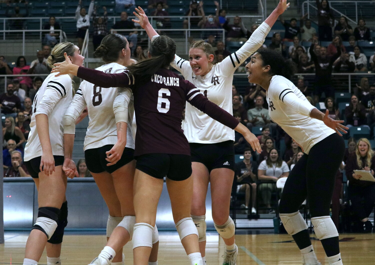 Cinco Ranch celebrates after winning a set during Tuesday’s match between Cinco Ranch and Cy-Fair at the Merrell Center.