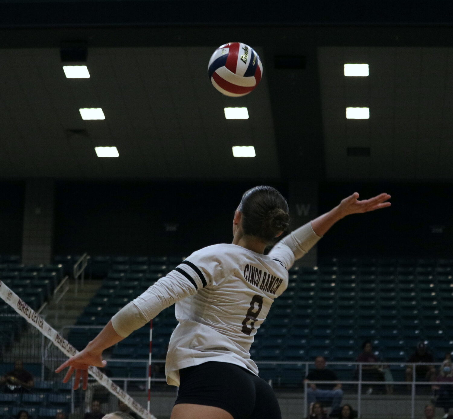 Makenna Loo spikes the ball during Tuesday’s match between Cinco Ranch and Cy-Fair at the Merrell Center.