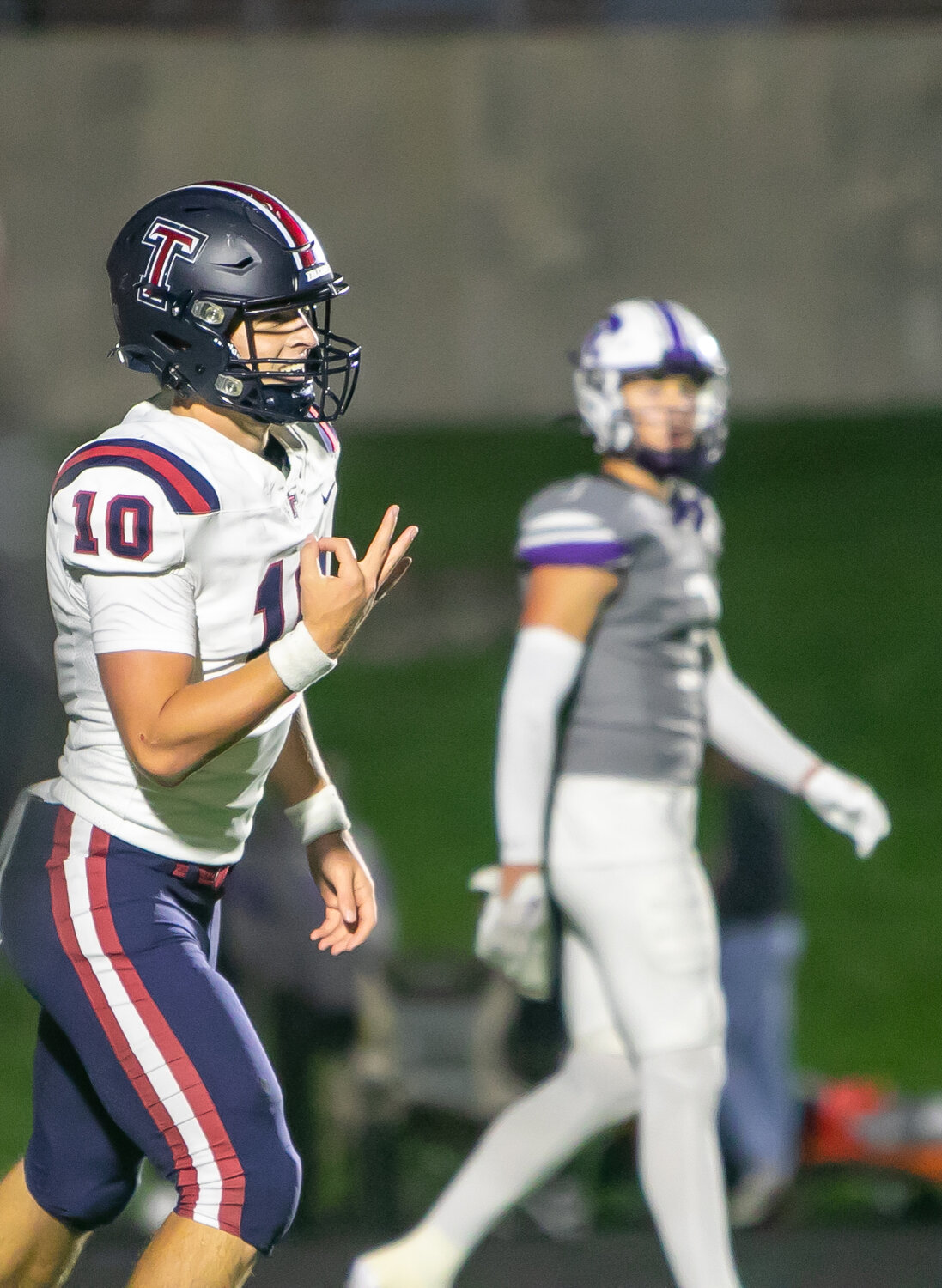 Wyatt Young celebrates after scoring a touchdown during Friday's game between Tompkins and Ridge Point at Hall Stadium.
