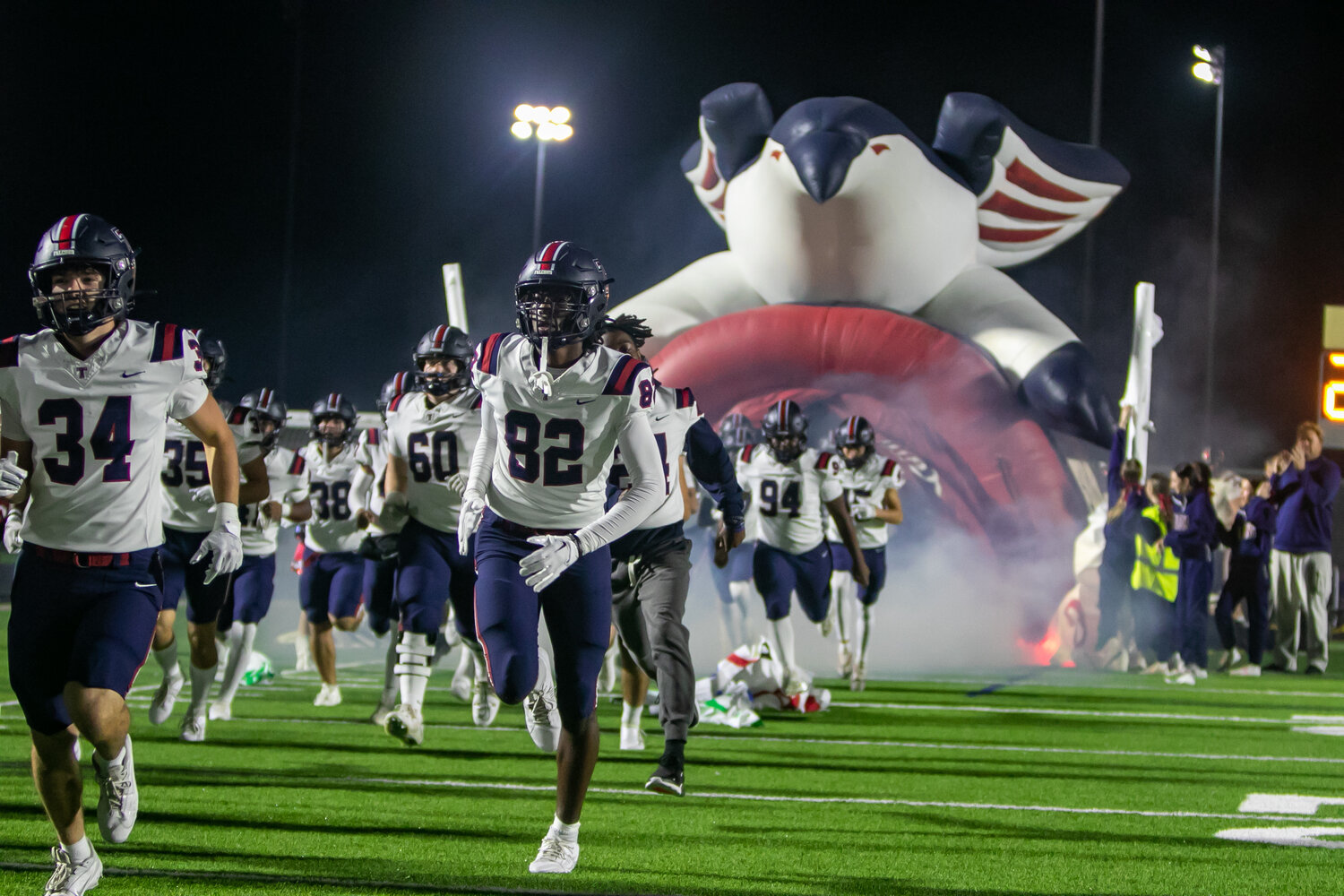 Tompkins takes the field for their bi-district game against Ridge Point at Hall Stadium.