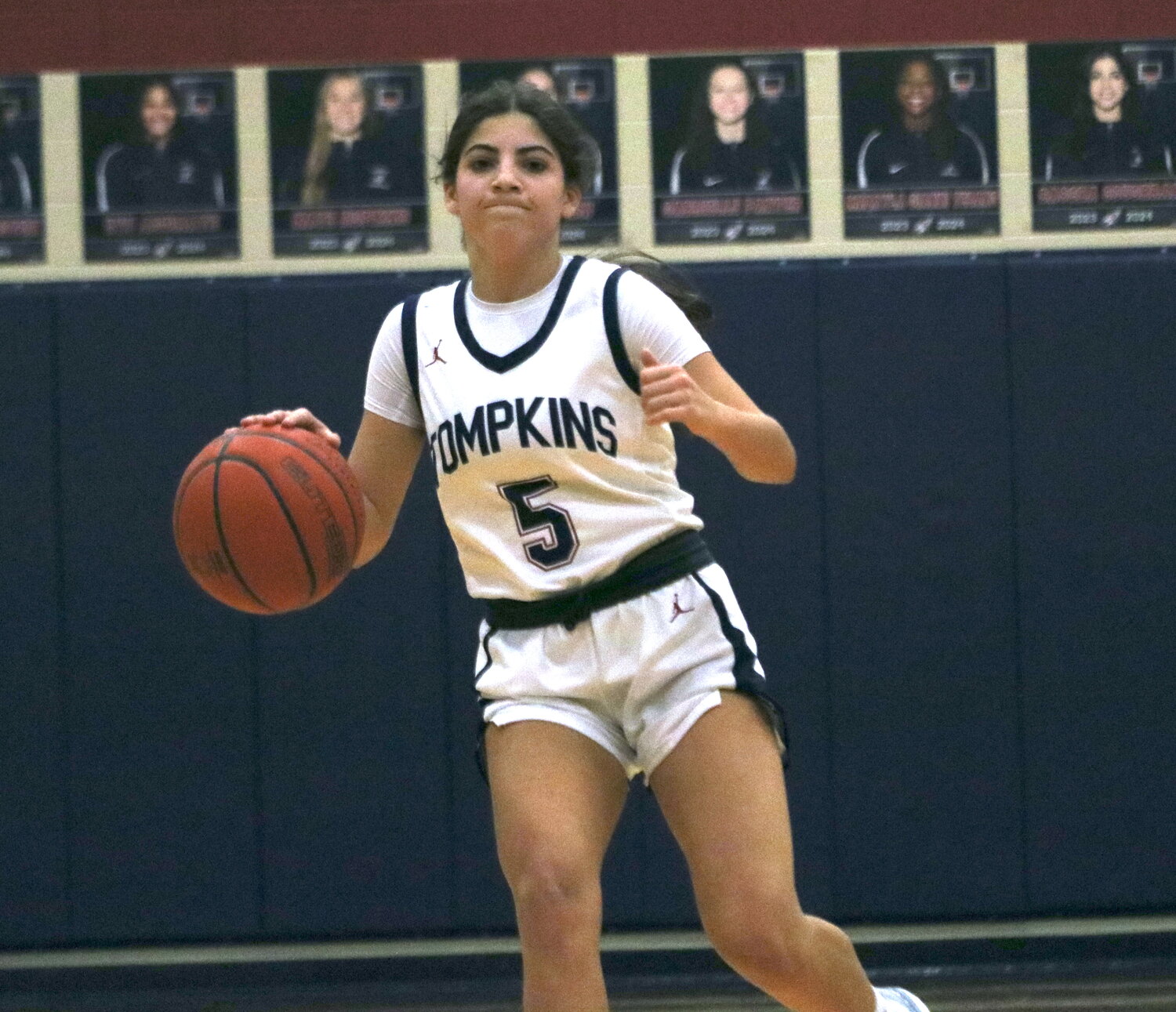 Sascha Coughran dribbles up the court during Tuesday's game between Tompkins and Cinco Ranch at the Tompkins gym.