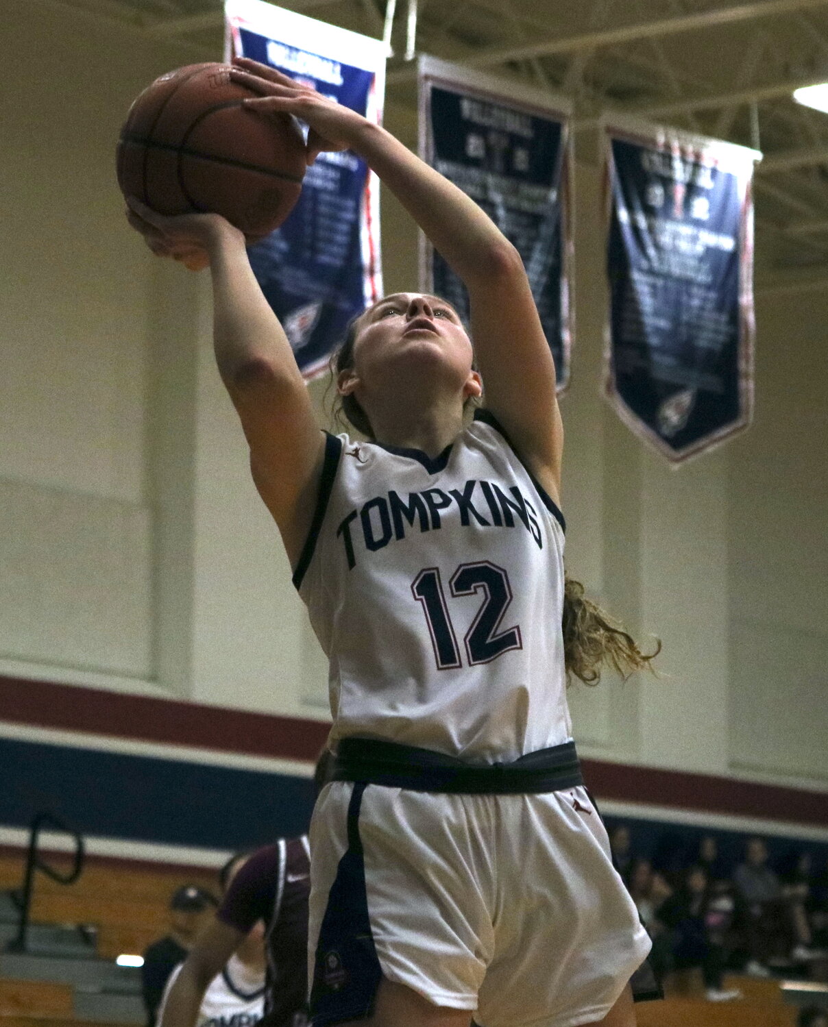 Haylie Panter shoots a layup during Tuesday's game between Tompkins and Cinco Ranch at the Tompkins gym.