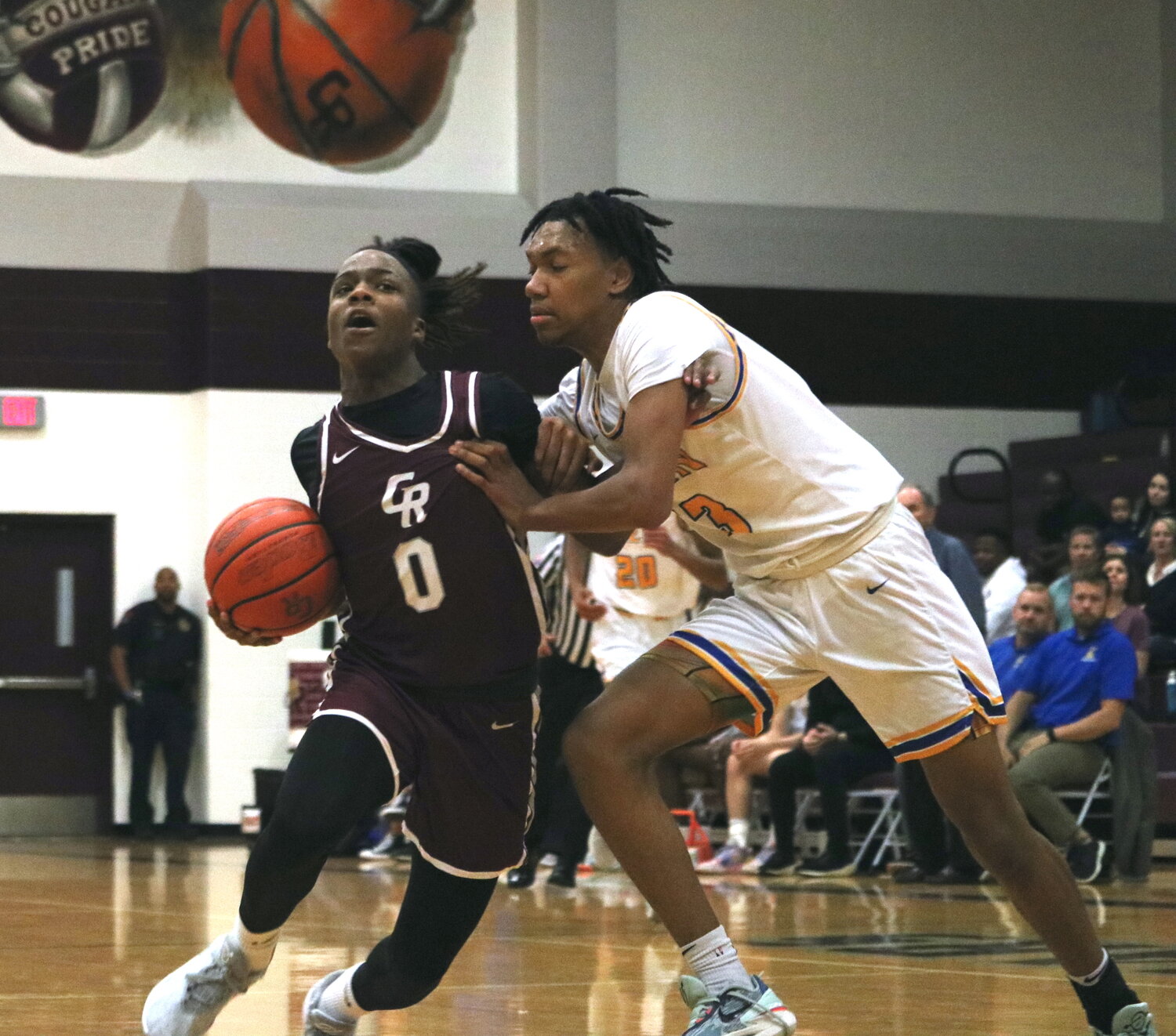 Prince Jones-Bynum fights through contact during Friday's game between Cinco Ranch and Klein at the Cinco Ranch gym.