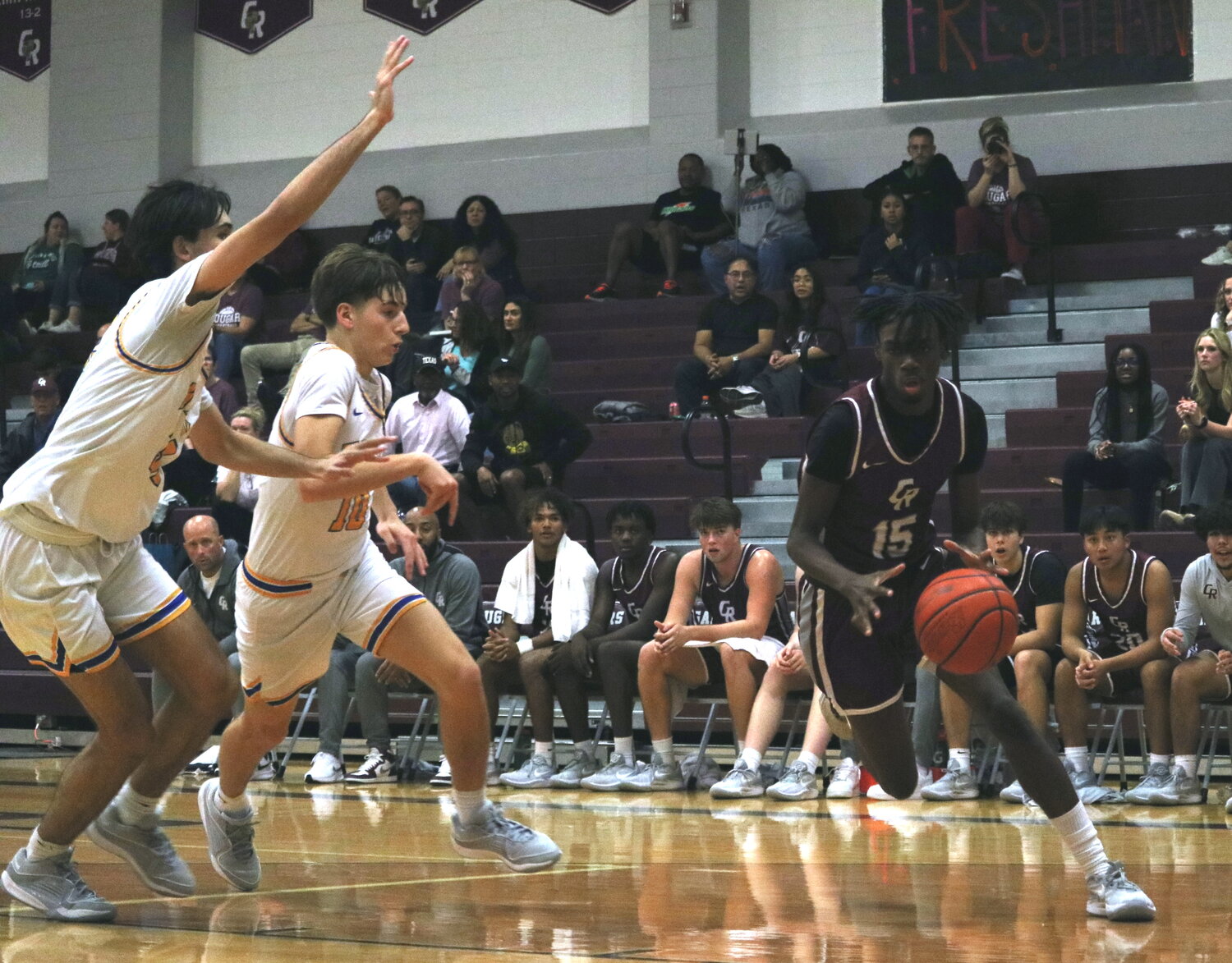 Pat Origo drives to the basket during Friday's game between Cinco Ranch and Klein at the Cinco Ranch gym.