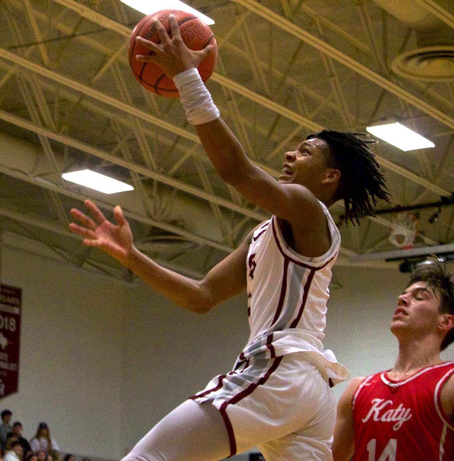 Dylan Jones-Bynum shoots a layup during Wednesday’s game between Katy and Cinco Ranch at the Cinco Ranch gym.