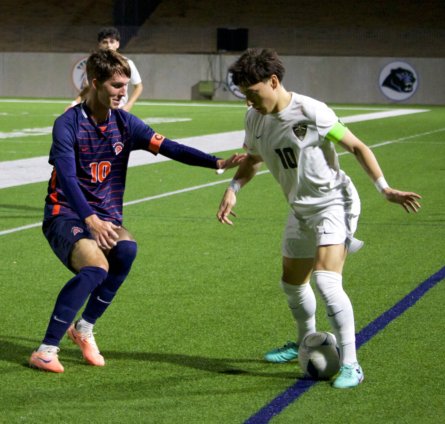 Marcelo Ojeda tries to get past Aidan Morrison during Friday’s game between Seven Lakes and Jordan at Legacy Stadium.