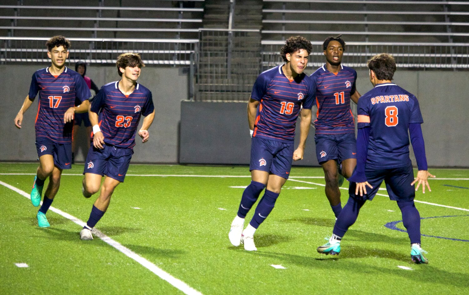 Jesus Duque and Fernando Lazo celebrate after Duque scored a goal during Friday’s game between Seven Lakes and Jordan at Legacy Stadium.