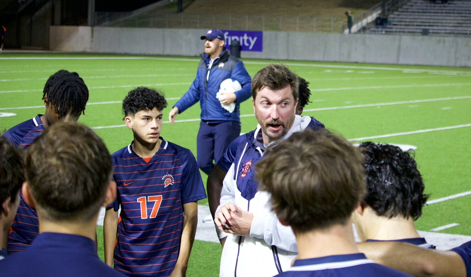 Seven Lakes head coach Jimmy Krueger talks to his team Friday’s game between Seven Lakes and Jordan at Legacy Stadium.